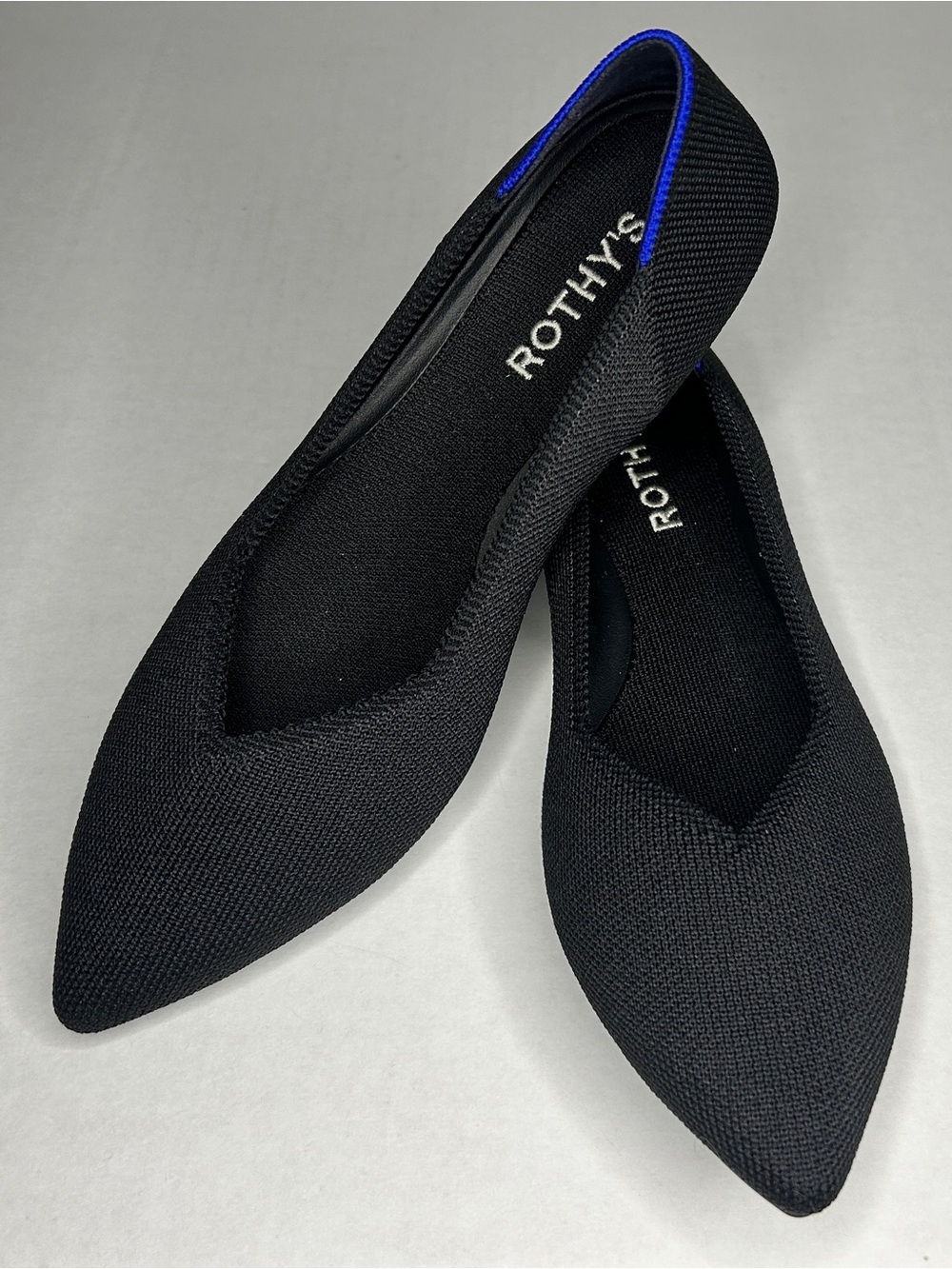 Rothy's Black Pointed Ballet Flat with Blue Trim